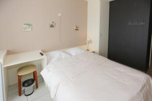 Postel nebo postele na pokoji v ubytování Hotel De Zeebries