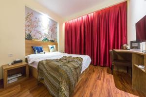 Postel nebo postele na pokoji v ubytování 落脚城市青年旅舍 + 66 fotografií