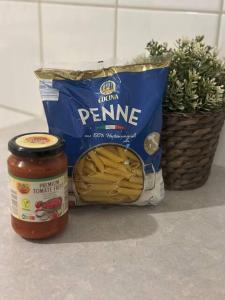 a bag of prime and a packet of peanut butter and a bag of pasta at Central Hideaway Garden, Parking, Cinema,4,5rooms in Zürich +12 photos