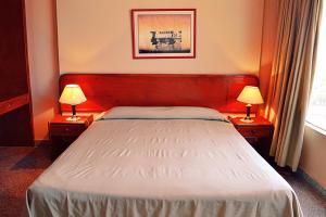 Krevet ili kreveti u jedinici u okviru objekta Hotel Manduara