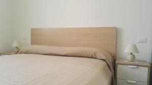 Postel nebo postele na pokoji v ubytování Le Casette