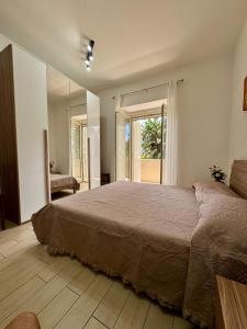 Ένα ή περισσότερα κρεβάτια σε δωμάτιο στο Marianna's House