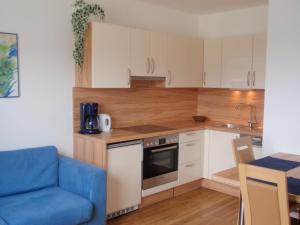 A kitchen or kitchenette at Ferienwohnungen Kern