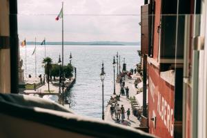a view of a body of water from a building at Borgo di Lazise - Adults friendly in Lazise