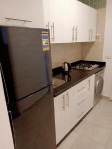 Η κουζίνα ή μικρή κουζίνα στο House of Happiness Level 2