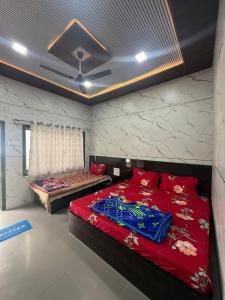 a bedroom with two beds in a room at Patil residency in Matheran