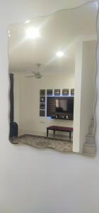TV a/nebo společenská místnost v ubytování AHNa HOMESTAY TELUK KEMANG