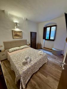 Ένα ή περισσότερα κρεβάτια σε δωμάτιο στο CASA ALDOBRANDESCHI - Tuscan ToBe +4 φωτογραφίες