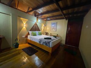 Ένα ή περισσότερα κρεβάτια σε δωμάτιο στο Villa D' Amore