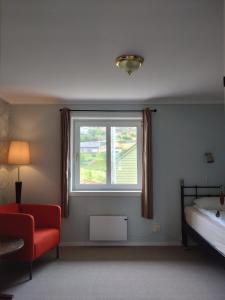 Postel nebo postele na pokoji v ubytování Hardanger Rom & Harmonium "The Green B&B"