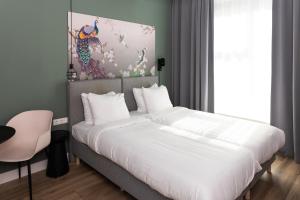 Postel nebo postele na pokoji v ubytování Hotel2Stay + 53 fotografií