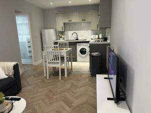 Kuchyň nebo kuchyňský kout v ubytování The Loft + 10 fotografií