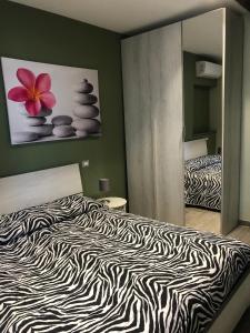 Ένα ή περισσότερα κρεβάτια σε δωμάτιο στο Claudia's Flat