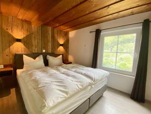 Postel nebo postele na pokoji v ubytování Landhaus Angerhof