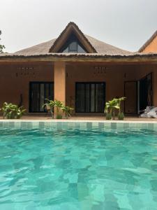 Πισίνα στο ή κοντά στο Villa oasis, Résidence Nianing +4 φωτογραφίες