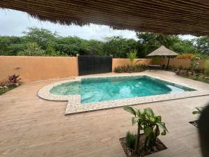 Πισίνα στο ή κοντά στο Villa oasis, Résidence Nianing