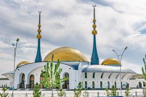 a mosque with two domes on top of it at City Center Apartment "Afsona mall" in Irvadan