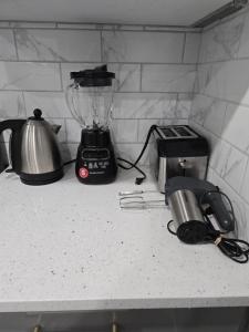 Η κουζίνα ή μικρή κουζίνα στο Cozy Basement Suite, SW Calgary