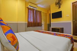 TV a/nebo společenská místnost v ubytování FabHotel 29 Beach House
