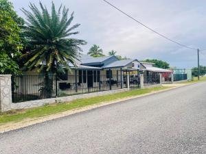a building on the side of a street at Vaikona Lodge in Ha’apai