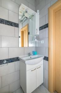Kúpeľňa v ubytovaní Apartment Afrika + 36 fotografií