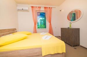 Posteľ alebo postele v izbe v ubytovaní Apartment Afrika