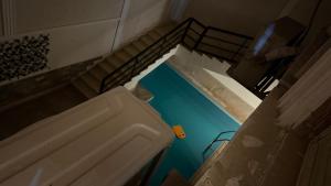 an overhead view of a pool in a bathroom at جاردن هوم الارضي مع البول Garden Home with pool ال عصام in 6th Of October