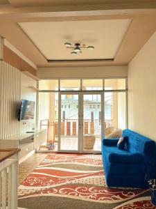 Μια τηλεόραση ή/και κέντρο ψυχαγωγίας στο Homestay Lidah Buaya 3 Syariah