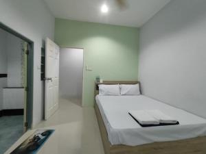 Postel nebo postele na pokoji v ubytování Krabi Rooms + 7 fotografií