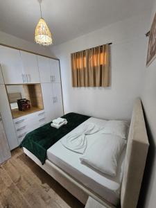 Una cama o camas en una habitación de Rafa's Apartament