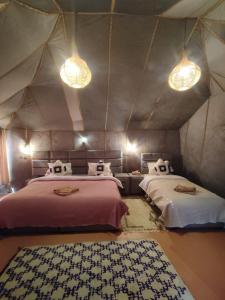 Una cama o camas en una habitación de ChariF Luxury Camp
