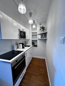 Køkken eller tekøkken på CENTRUM Marszalkowska APPART Parking + 10 billeder