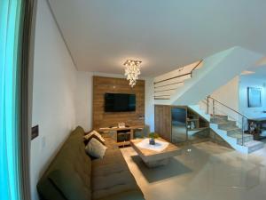 TV a/nebo společenská místnost v ubytování cód 64 - Casa germinada espetacular! + 26 fotografií