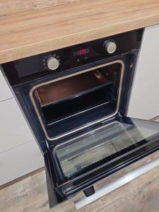 a toaster oven sitting on top of a counter at Appartement T2 moderne 2 à 4 personnes in Lucciana