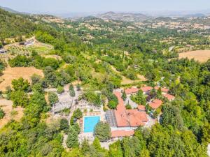 an aerial view of a mansion with a swimming pool at EMAN TERMAL HOTEL in Ilıcalı