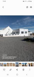 a white building sitting on top of a pile of gravel at Mesklip Caravan Park in Springbok