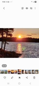 a screenshot of a cell phone screen with a sunset at Twin Bucks Cabin in Whiting +10 photos