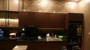 Kuchyň nebo kuchyňský kout v ubytování MD Hotel