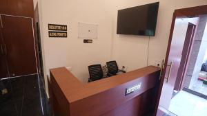 Et tv og/eller underholdning på Hotel Gupta Garden