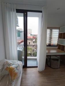 Postel nebo postele na pokoji v ubytování The Full House