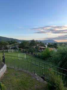 a view of a soccer field behind a fence at Montecielo in San Antonio de Arredondo +15 photos