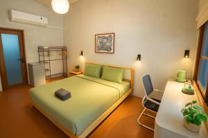 Voodi või voodid majutusasutuse Beach Jungle toas