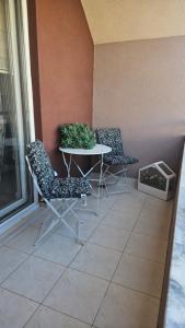 Patio nebo venkovní prostory v ubytování Luxury Flat