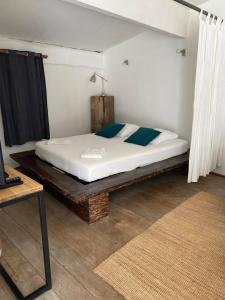 En eller flere senge i et værelse på L'Auberge d 'Eva - Gîtes + 9 billeder