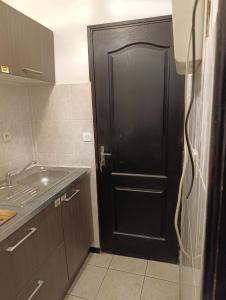 Η κουζίνα ή μικρή κουζίνα στο Appartement 2 pièces