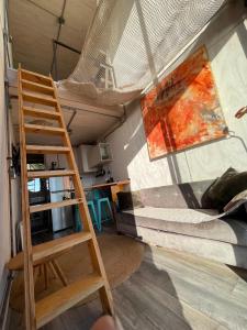 Kuchyň nebo kuchyňský kout v ubytování AKA Tiny House