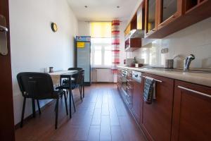 Kuchyň nebo kuchyňský kout v ubytování Hostel 4you + 37 fotografií