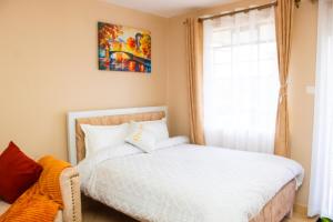 Postel nebo postele na pokoji v ubytování Comfy modern studio in Kitisuru + 12 fotografií