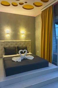 Ένα ή περισσότερα κρεβάτια σε δωμάτιο στο Luxury Nest