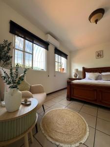 Postel nebo postele na pokoji v ubytování Casa Santa Elena Fuertevli